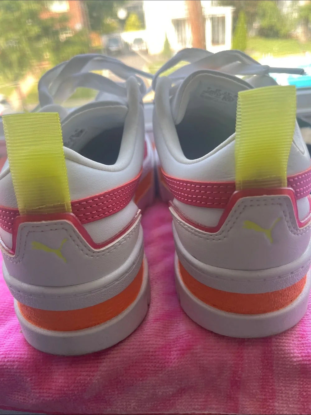 Puma Kids White Sneakers with Neon Yellow and Orange Accents